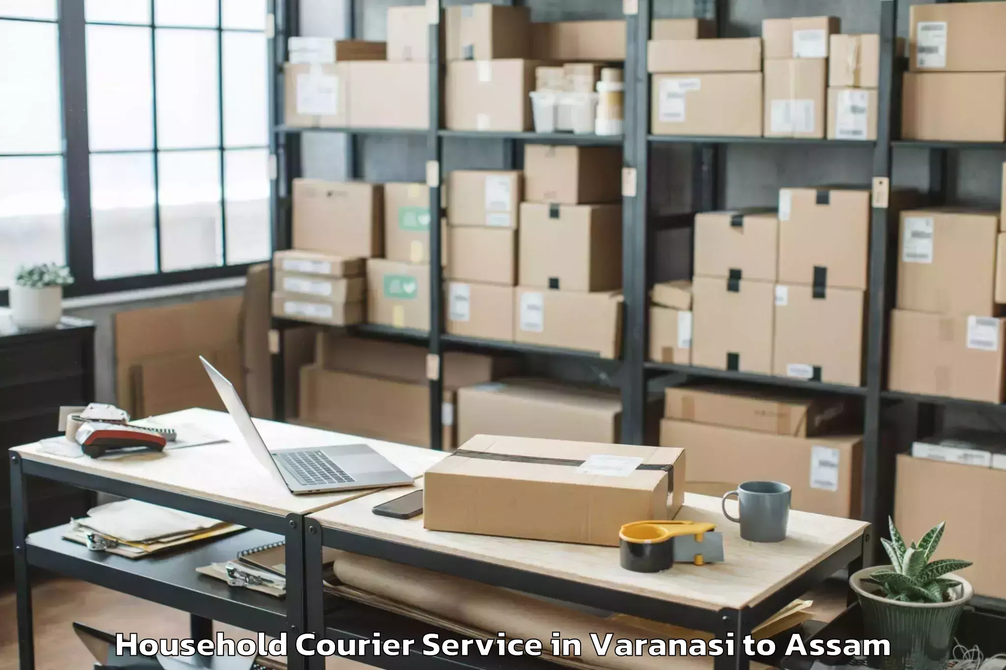 Top Varanasi to Bokajan Household Courier Available